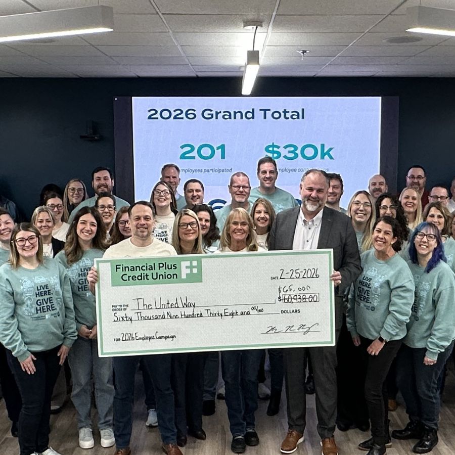 Financial Plus Credit Union team presenting $65,000 check to the United Way.