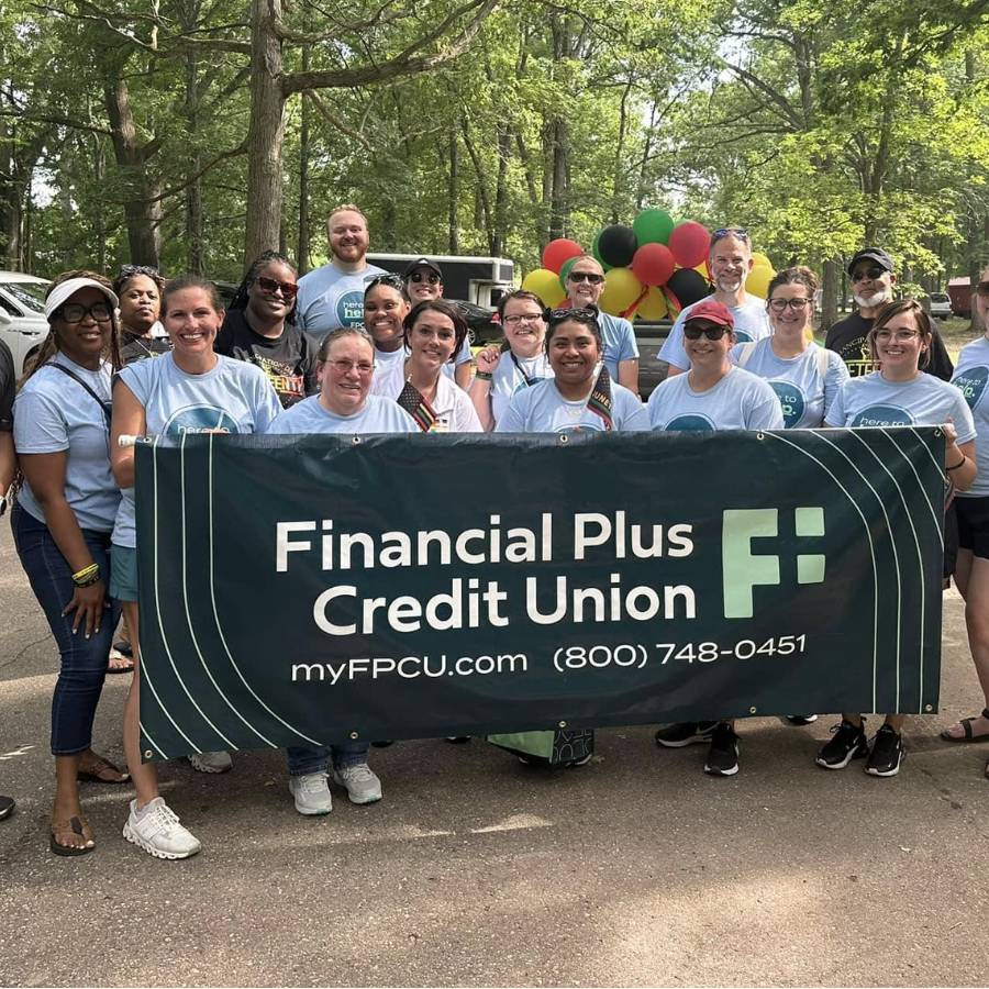 Financial Plus employees at the Flint Juneteenth parade.